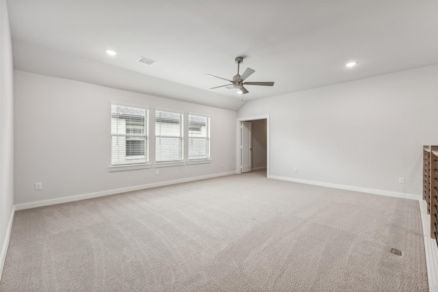 carpeted empty room featuring visible vents, baseboards, a ceiling fan, and recessed lighting