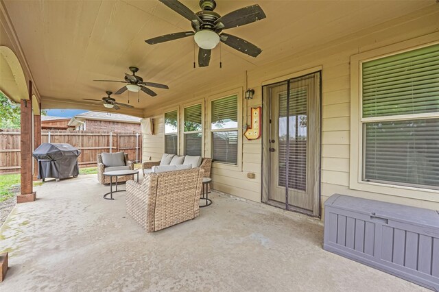 back of house featuring a patio area, ceiling fan, a chimney, and a lawn