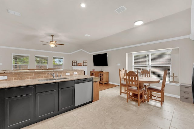 kitchen with lofted ceiling, a sink, visible vents, ornamental molding, and stainless steel dishwasher