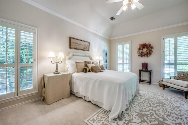 bedroom featuring light carpet, ornamental molding, vaulted ceiling, and visible vents