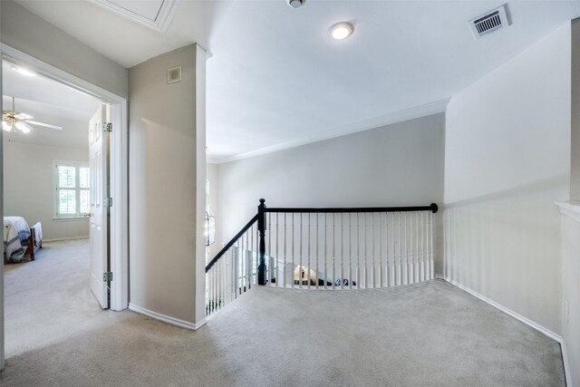 1325 Coral Dr, Coppell, TX 75019 - hall with visible vents, carpet, baseboards, and an upstairs landing