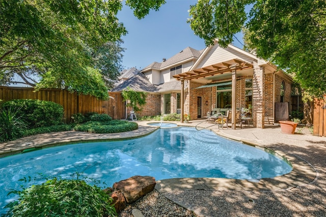 view of pool featuring a fenced in pool, a patio area, a fenced backyard, and an in ground hot tub