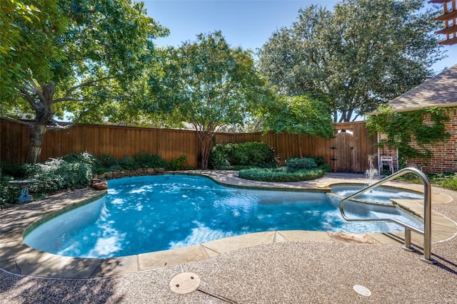 view of pool featuring a fenced in pool and a fenced backyard