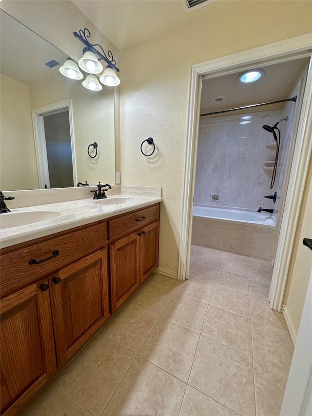 bathroom featuring tile patterned flooring, visible vents, a sink, and double vanity