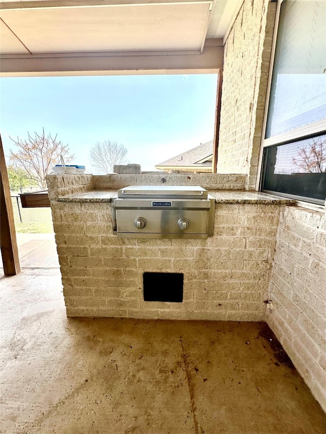 view of patio / terrace with exterior kitchen and area for grilling