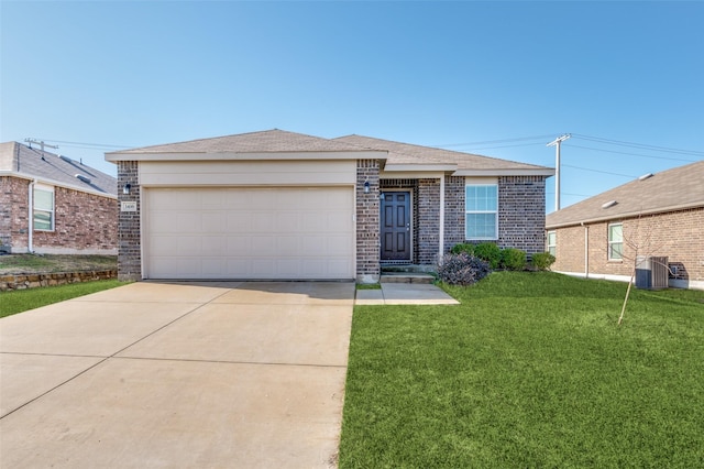 view of front of house with an attached garage, central air condition unit, brick siding, concrete driveway, and a front yard