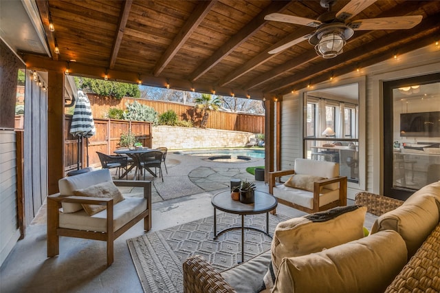 view of patio / terrace with a fenced in pool, ceiling fan, an outdoor hangout area, fence, and outdoor dining space