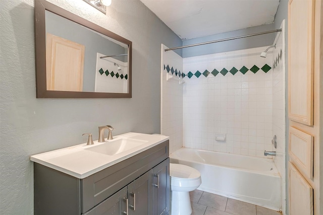 full bathroom featuring shower / washtub combination, vanity, toilet, and tile patterned floors