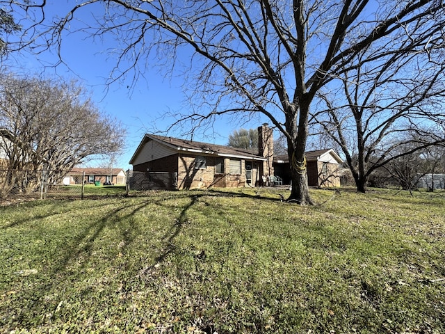 view of yard featuring fence