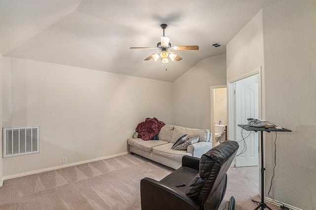 living room with ceiling fan, visible vents, baseboards, vaulted ceiling, and carpet