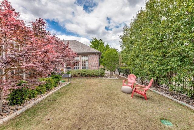 view of yard with fence