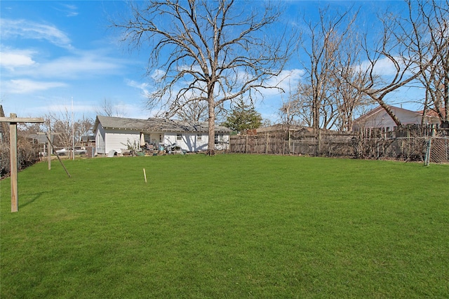 view of yard featuring fence