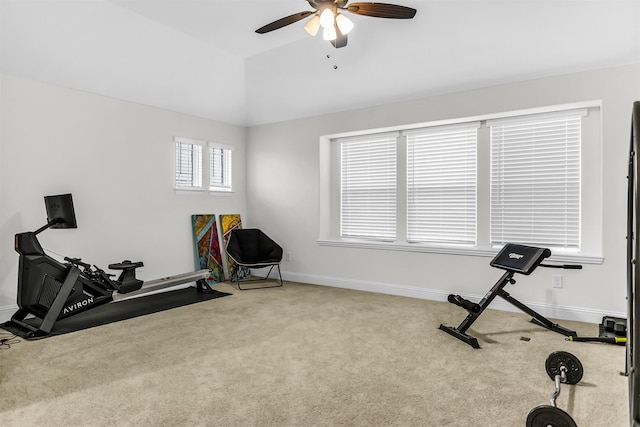 workout room featuring carpet floors, baseboards, a ceiling fan, and lofted ceiling