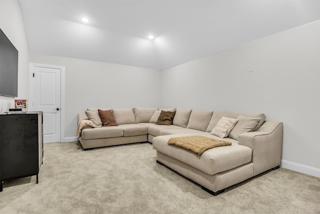 living area with light carpet, recessed lighting, baseboards, and lofted ceiling