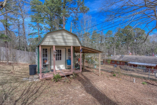 1106 Bryan St, Minden, LA 71055 - view of outdoor structure with fence and an outdoor structure