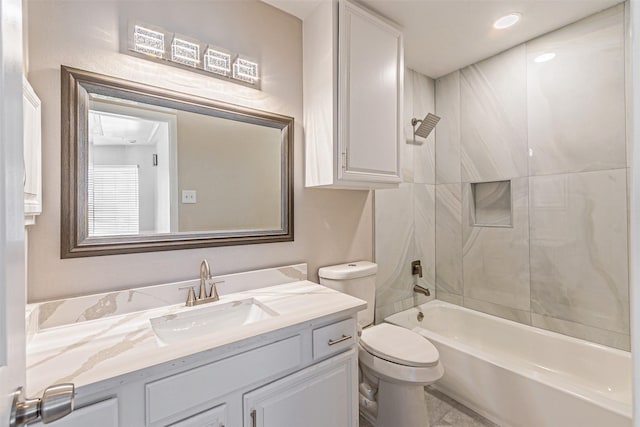 full bath with tub / shower combination, vanity, and toilet