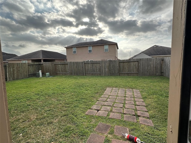 view of yard featuring a fenced backyard