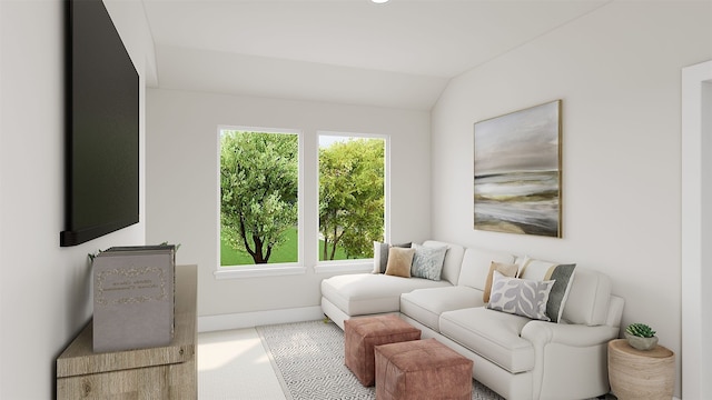 interior space with baseboards and vaulted ceiling