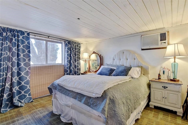 bedroom with a wall mounted air conditioner and wood ceiling