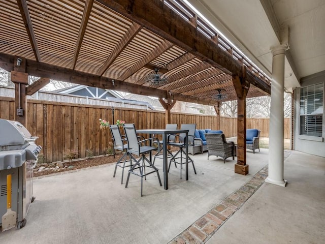 view of patio with grilling area, an outdoor hangout area, outdoor dining space, a pergola, and fence private yard