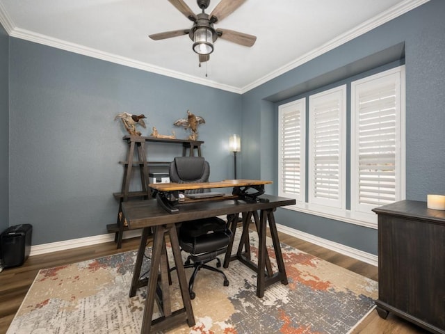 office area featuring ornamental molding, wood finished floors, a ceiling fan, and baseboards