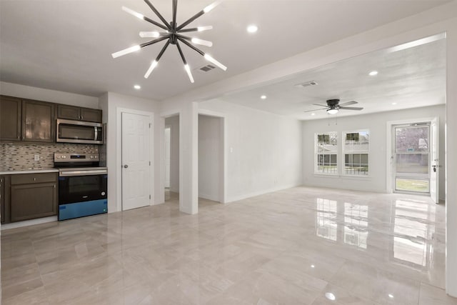 unfurnished living room featuring recessed lighting, visible vents, baseboards, and ceiling fan with notable chandelier