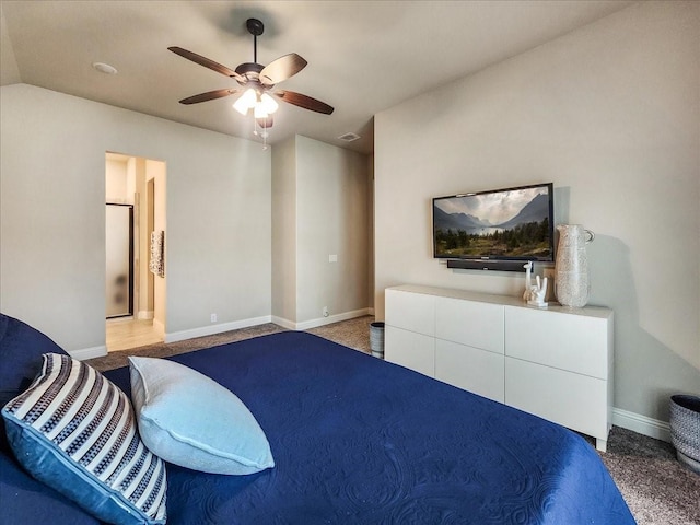 carpeted bedroom with baseboards, vaulted ceiling, and a ceiling fan