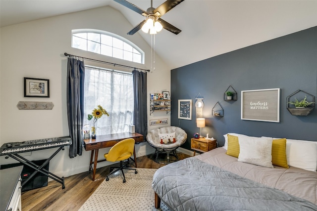 bedroom featuring high vaulted ceiling, ceiling fan, baseboards, and wood finished floors