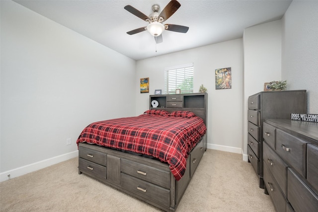 office area featuring baseboards, visible vents, a ceiling fan, and carpet