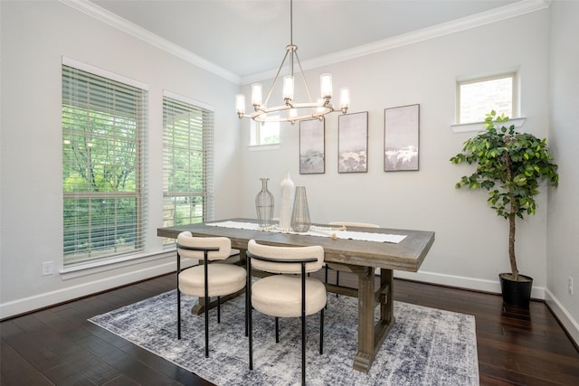 dining space with an inviting chandelier, baseboards, ornamental molding, and wood-type flooring