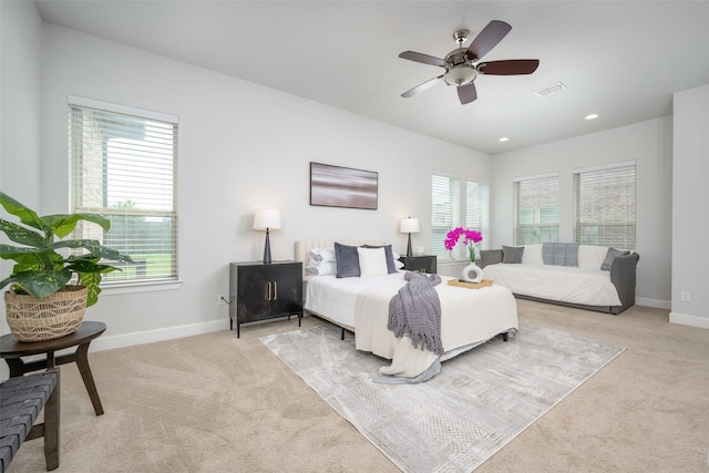 bedroom with recessed lighting, ceiling fan, visible vents, carpet, and baseboards