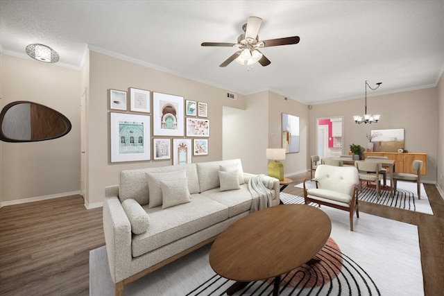 living area with baseboards and wood finished floors