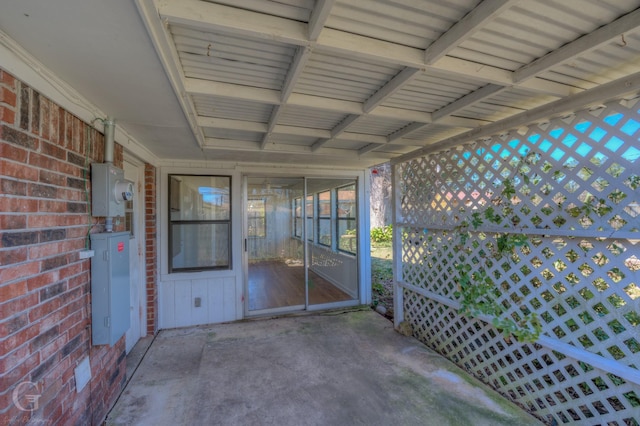 view of patio featuring electric panel