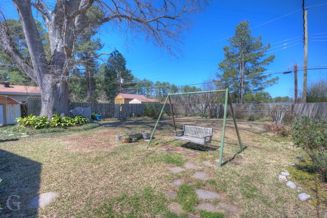 view of yard with a fenced backyard