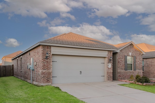 view of front facade featuring an attached garage, brick siding, fence, concrete driveway, and a front yard