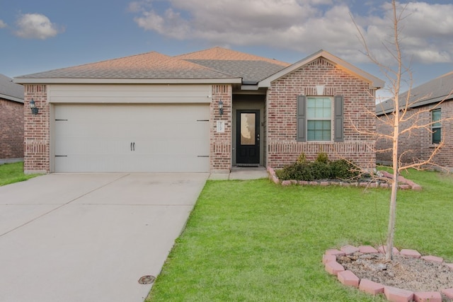 view of front of house with driveway, a garage, roof with shingles, a front lawn, and brick siding