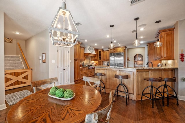 209 Chrissa Dr, Pottsboro, TX 75076 - dining area featuring dark wood-style flooring, baseboards, recessed lighting, stairs, and a chandelier