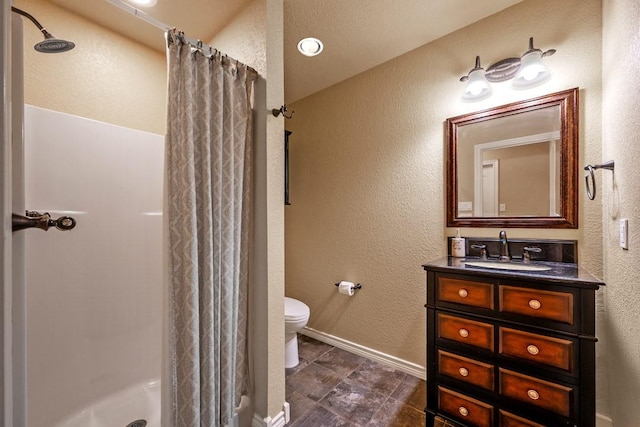 209 Chrissa Dr, Pottsboro, TX 75076 - bathroom featuring a shower with curtain, vanity, toilet, baseboards, and a textured wall