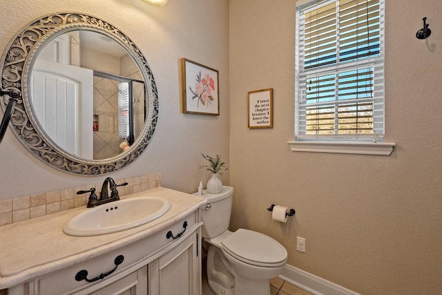 209 Chrissa Dr, Pottsboro, TX 75076 - bathroom featuring toilet, vanity, tile patterned flooring, a tile shower, and baseboards