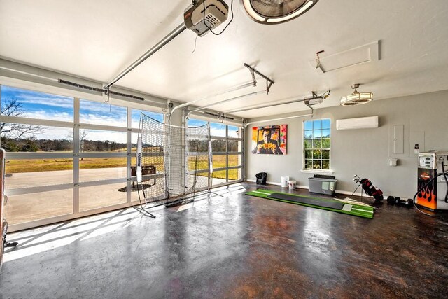 209 Chrissa Dr, Pottsboro, TX 75076 - garage featuring a garage door opener and a wall mounted air conditioner