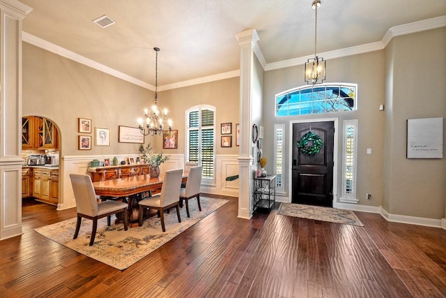 209 Chrissa Dr, Pottsboro, TX 75076 - foyer entrance with a chandelier, plenty of natural light, ornamental molding, and a wainscoted wall