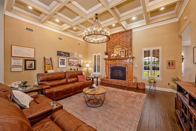 209 Chrissa Dr, Pottsboro, TX 75076 - living room featuring coffered ceiling, a towering ceiling, beam ceiling, ornamental molding, and a chandelier