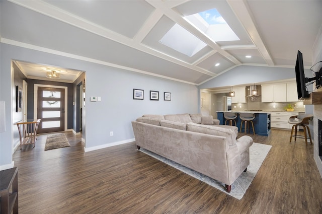 living room with dark wood-style floors, vaulted ceiling with skylight, crown molding, and baseboards