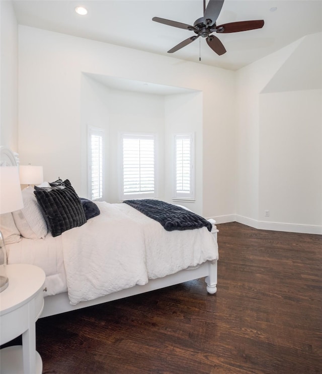 bedroom with baseboards, ceiling fan, wood finished floors, and recessed lighting