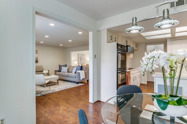 interior space featuring dark wood-style flooring and recessed lighting