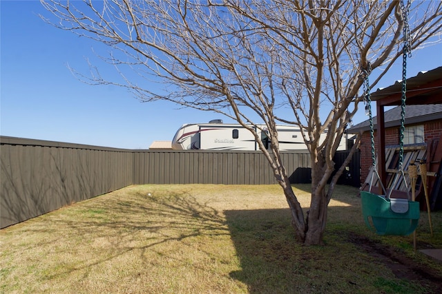 view of yard featuring fence