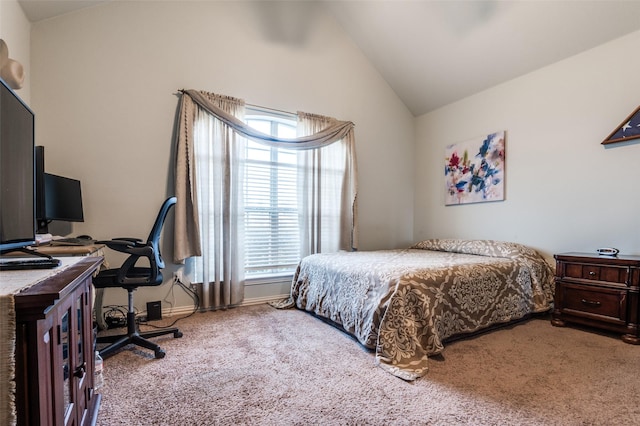 bedroom featuring carpet, lofted ceiling, and baseboards