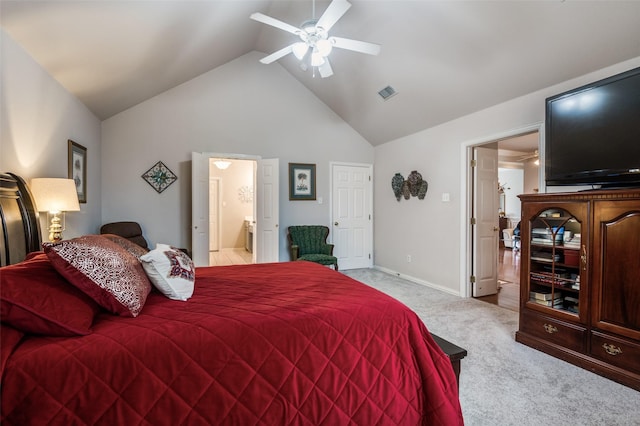 bedroom with baseboards, light colored carpet, ceiling fan, ensuite bathroom, and high vaulted ceiling