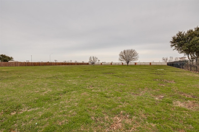 view of yard with fence