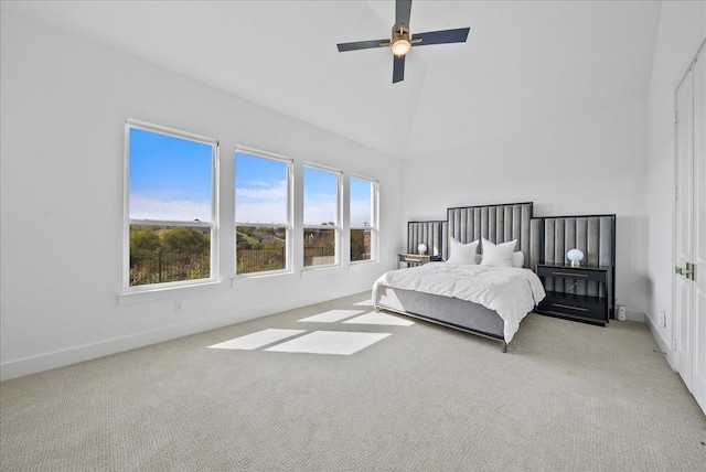 bedroom featuring high vaulted ceiling, carpet, baseboards, and a ceiling fan